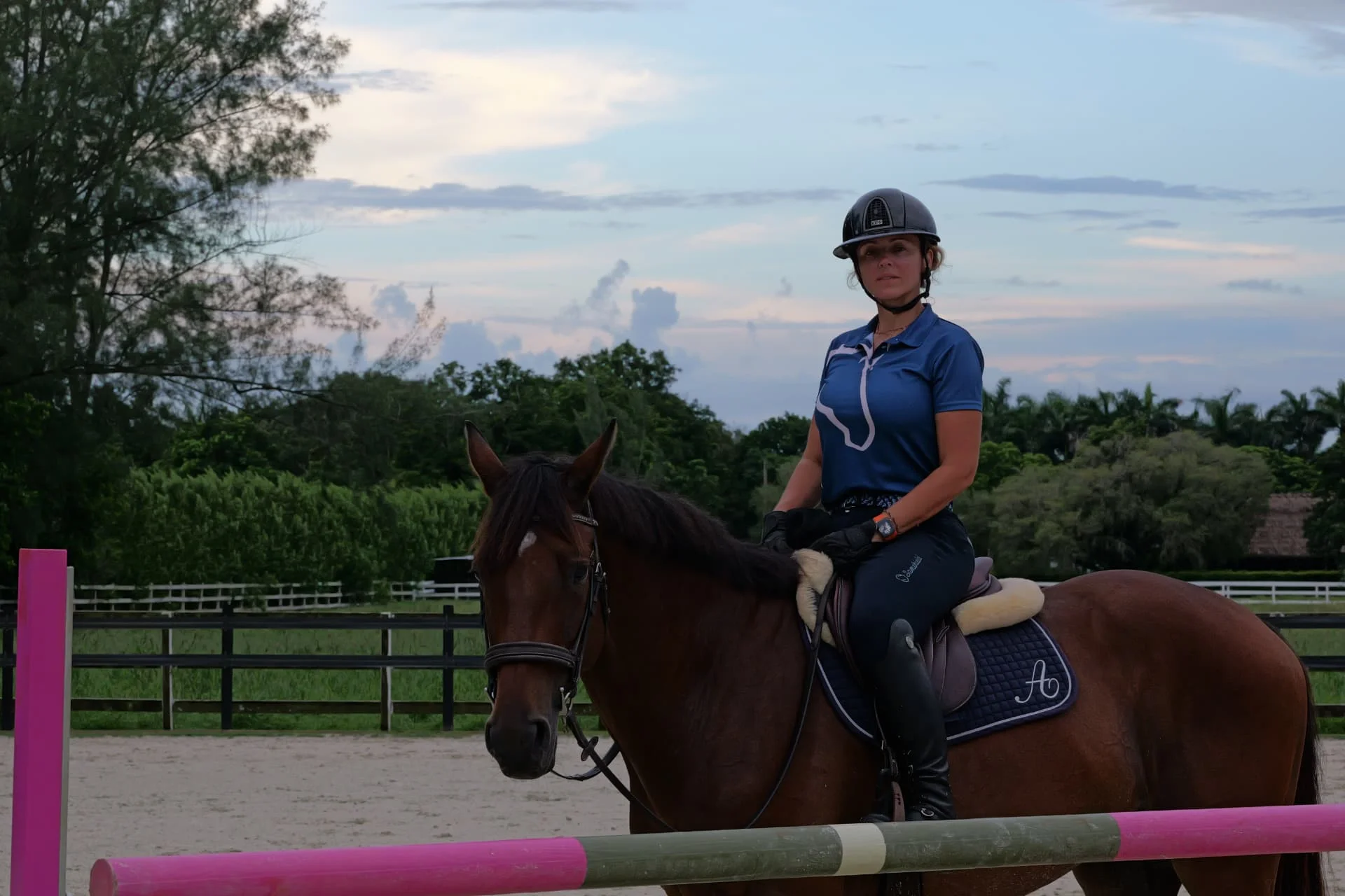 Rider and horse at a show jump at L'Écurie Equestrian Club in Southwest Ranches, Florida